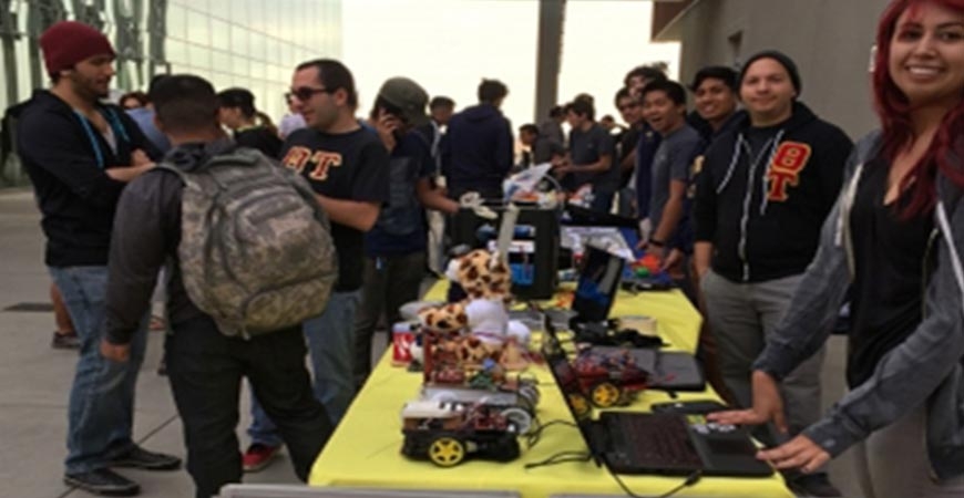 students showing off their robotic projects